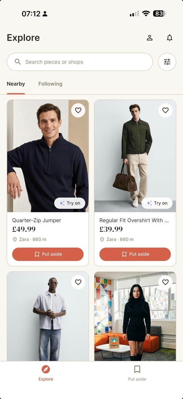 The Shoppermo Explore screen, showing real nearby boutique pieces with prices, a Try on badge, and a Put aside button.